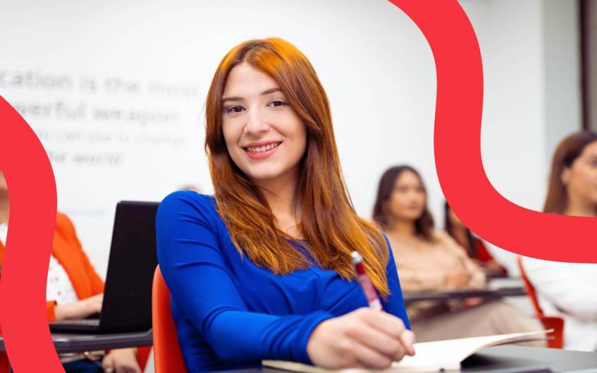 student looking at camera smiling