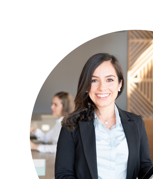 Image of a business woman in a suit smiling