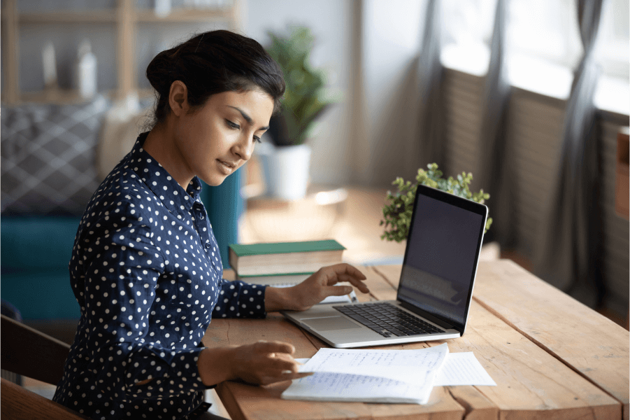 Woman researching on her laptop