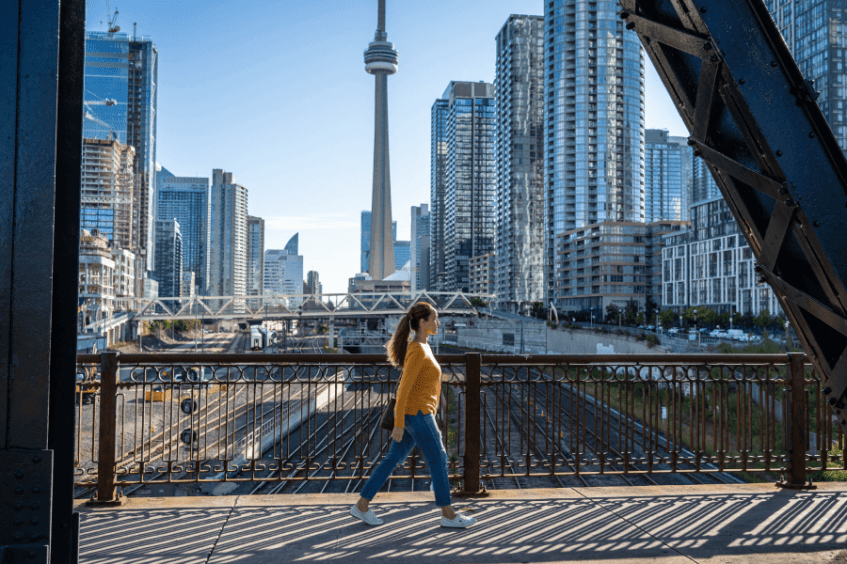 Image of a woman walking in Toronto